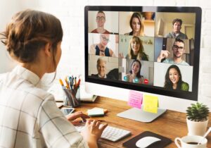 Teacher conducting an online language class using video conferencing – a common feature of modern platforms for language teaching.